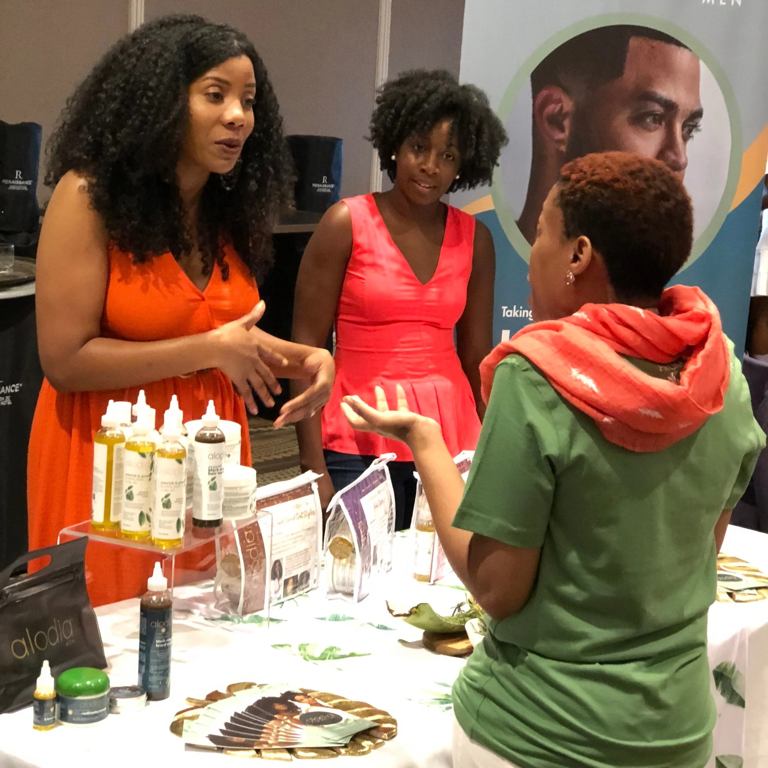 ALODIA HAIR CARE VENDOR TABLE AT THE MOMFERENCE 