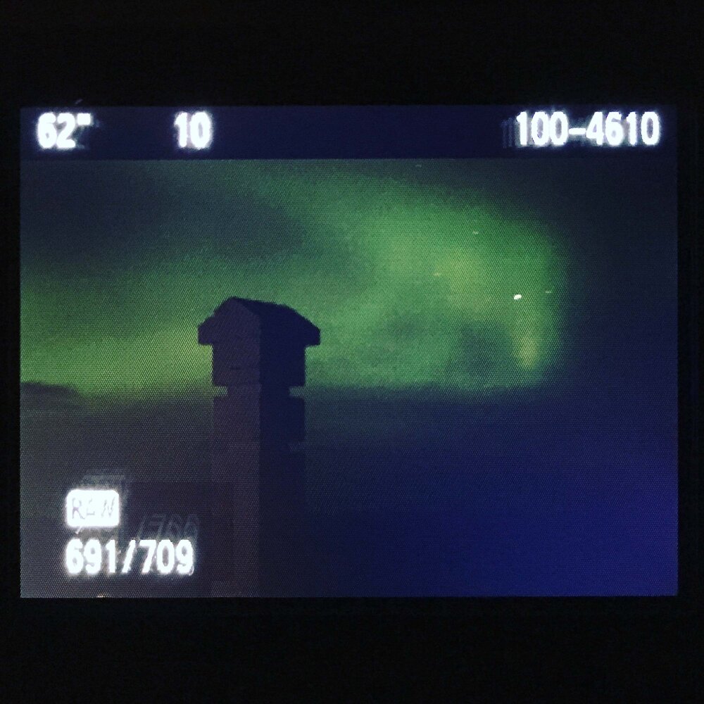 Aurora borealis over Iceland on camera screen