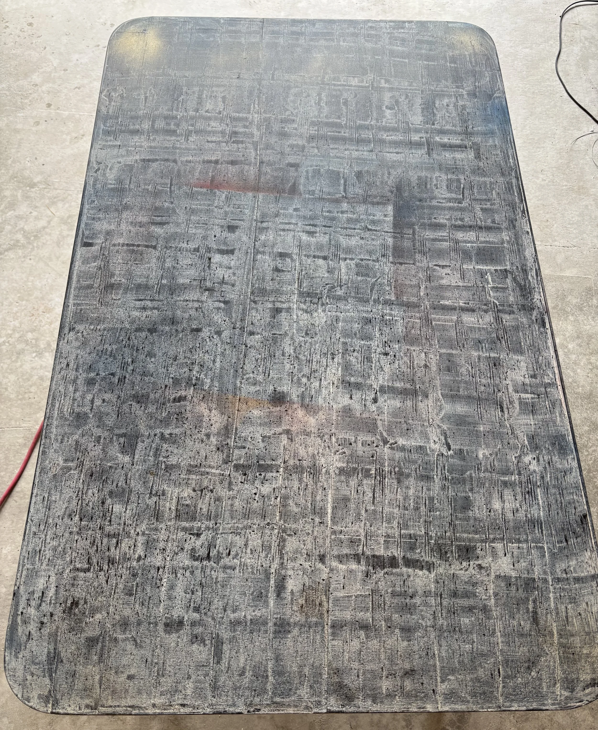 No. 82: The Gathering, refurbished table. Planed it down then gave it a black base coat adding in white and finishing off with MTN 94 spray paint and lacquer.