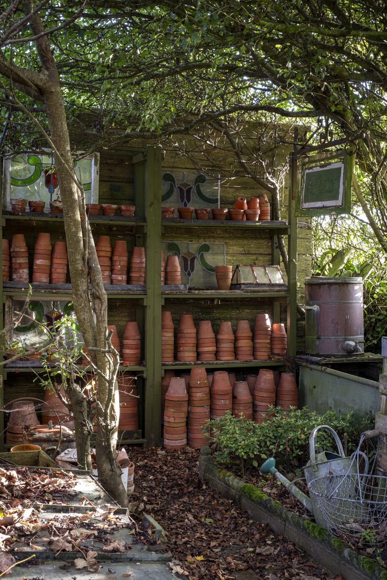 Piled terracotta pots at Beth Tarling's house in Cornwall