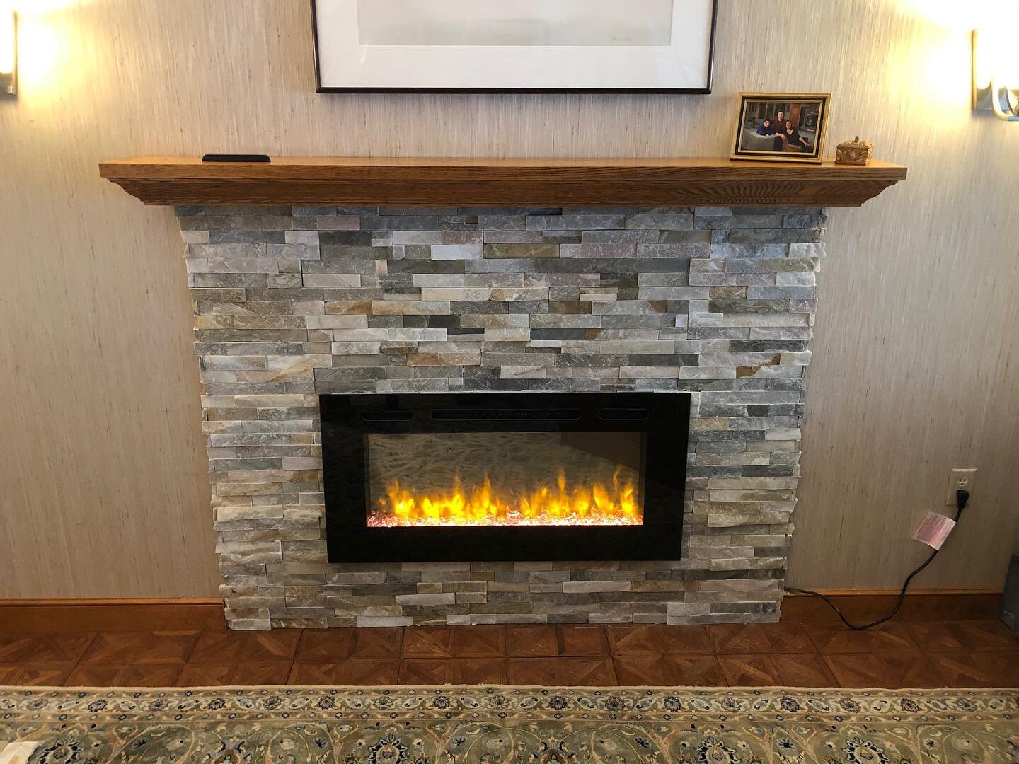 New fireplace with beautiful ledger stone is now complete 🔥 Swipe to see the progress! Who else is staying cozy by their fireplace this winter? ❄️
&bull;
Material: Ledger Stone from Anatolia Tile + Stone @anatoliatile, purchased from Fitzgerald Tile