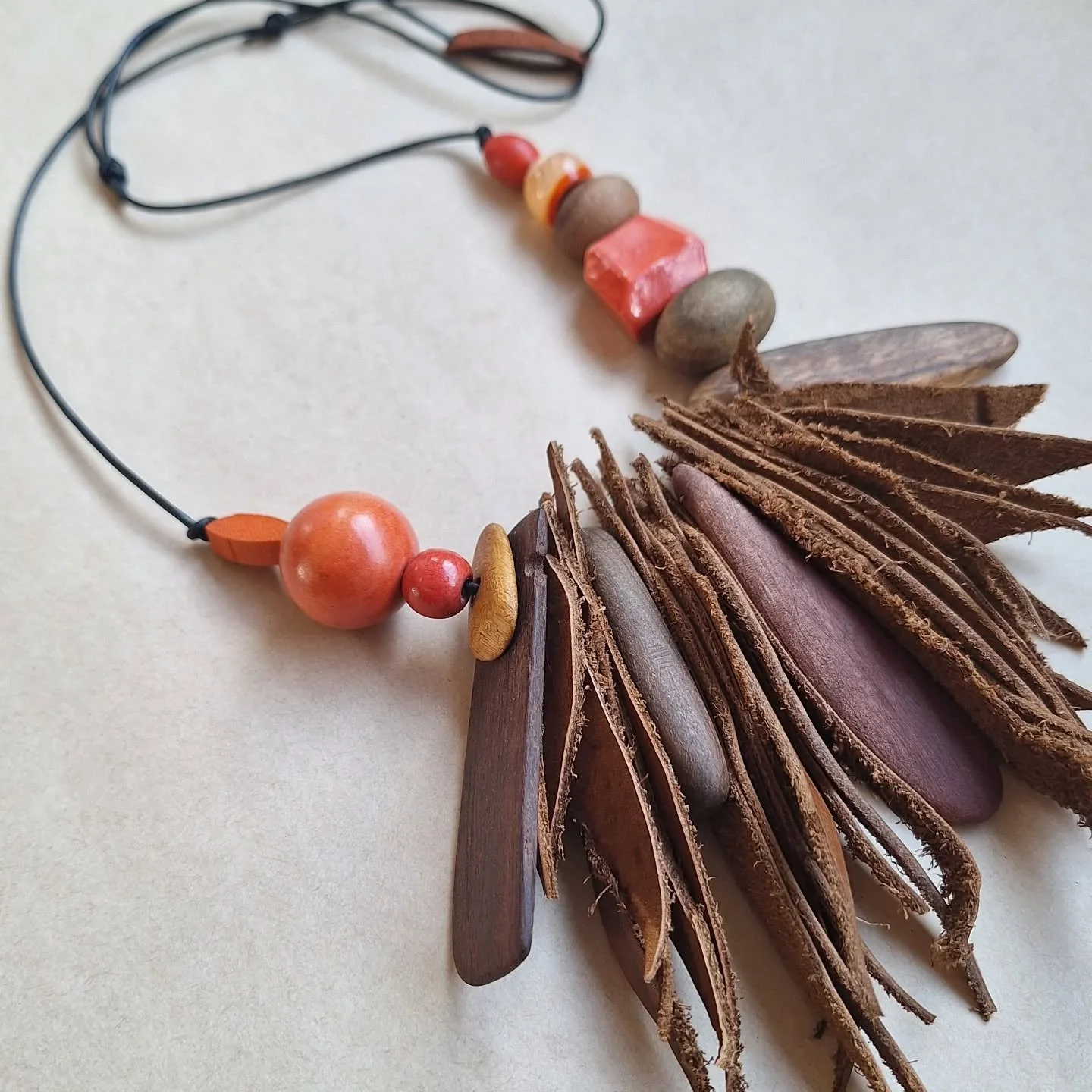 Feather necklace by MAINICHI recycled leather, reclaimed beads and salvaged timber.

If you'd like $10 off your first online order visit www.mainichi.com.au and sign up to our newsletter community

#handmadeinaustralia #ballaratdesigner #ballaratmake