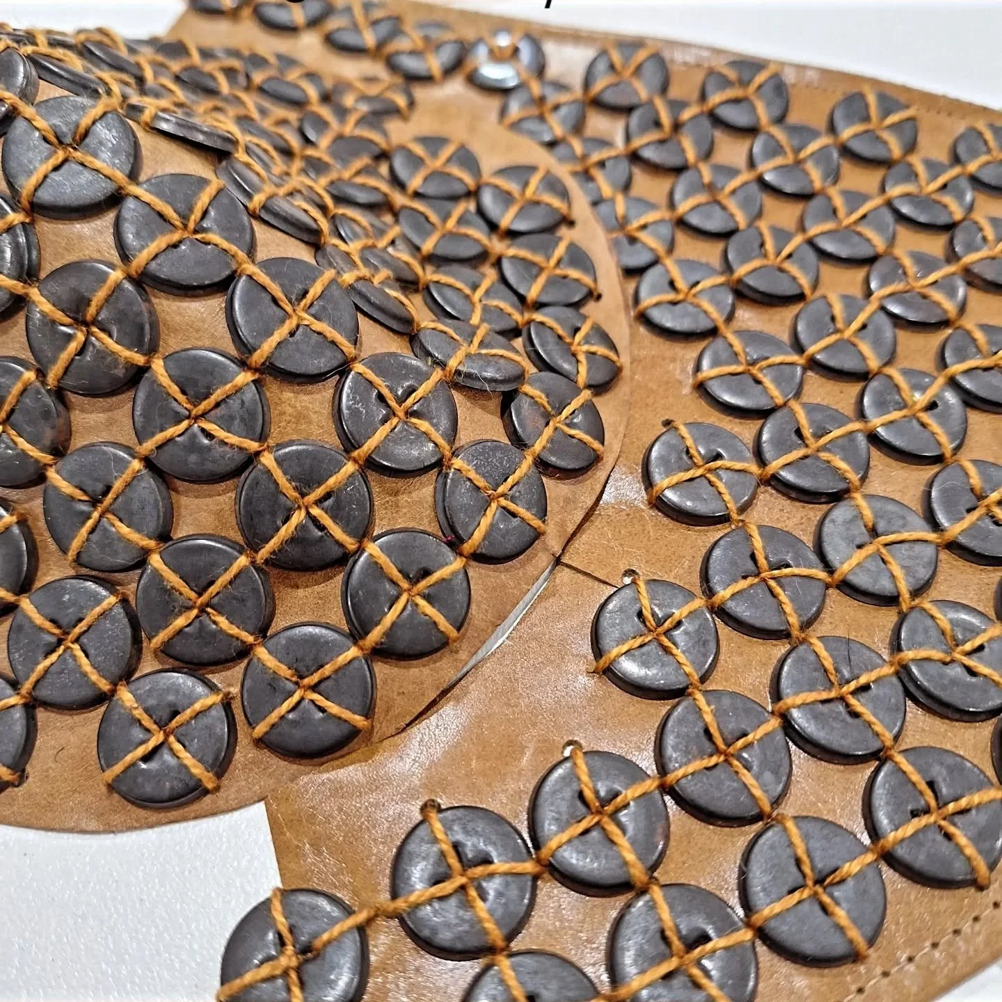 A few WIP and detail shots from the chest piece I crafted for BOUND.  The foundation for this piece was my own repurposed Taekwondo chest protector.  Female Taekwondo practitioners wear these chest guards underneath the traditional Hogu that protects