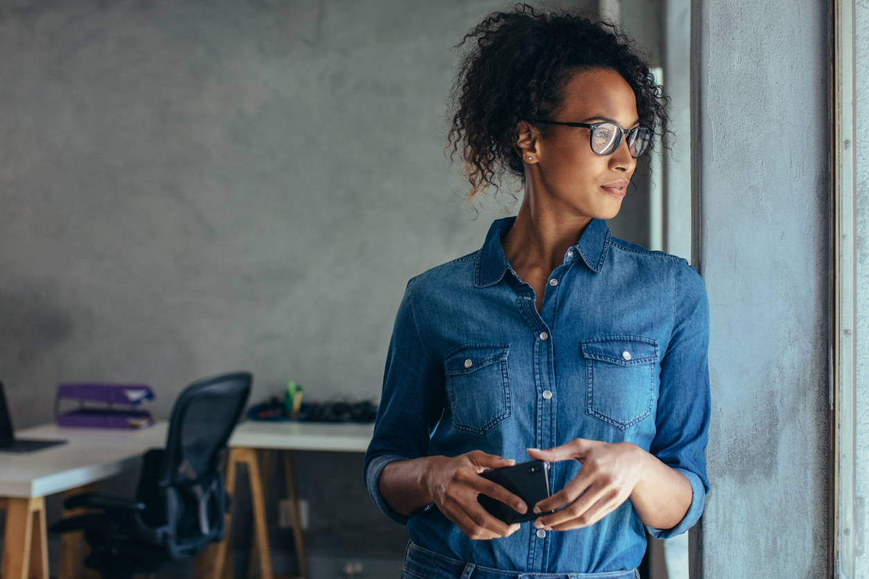 woman looking out window