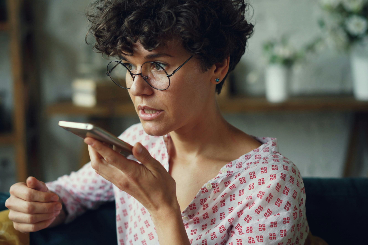 woman speaking into phone