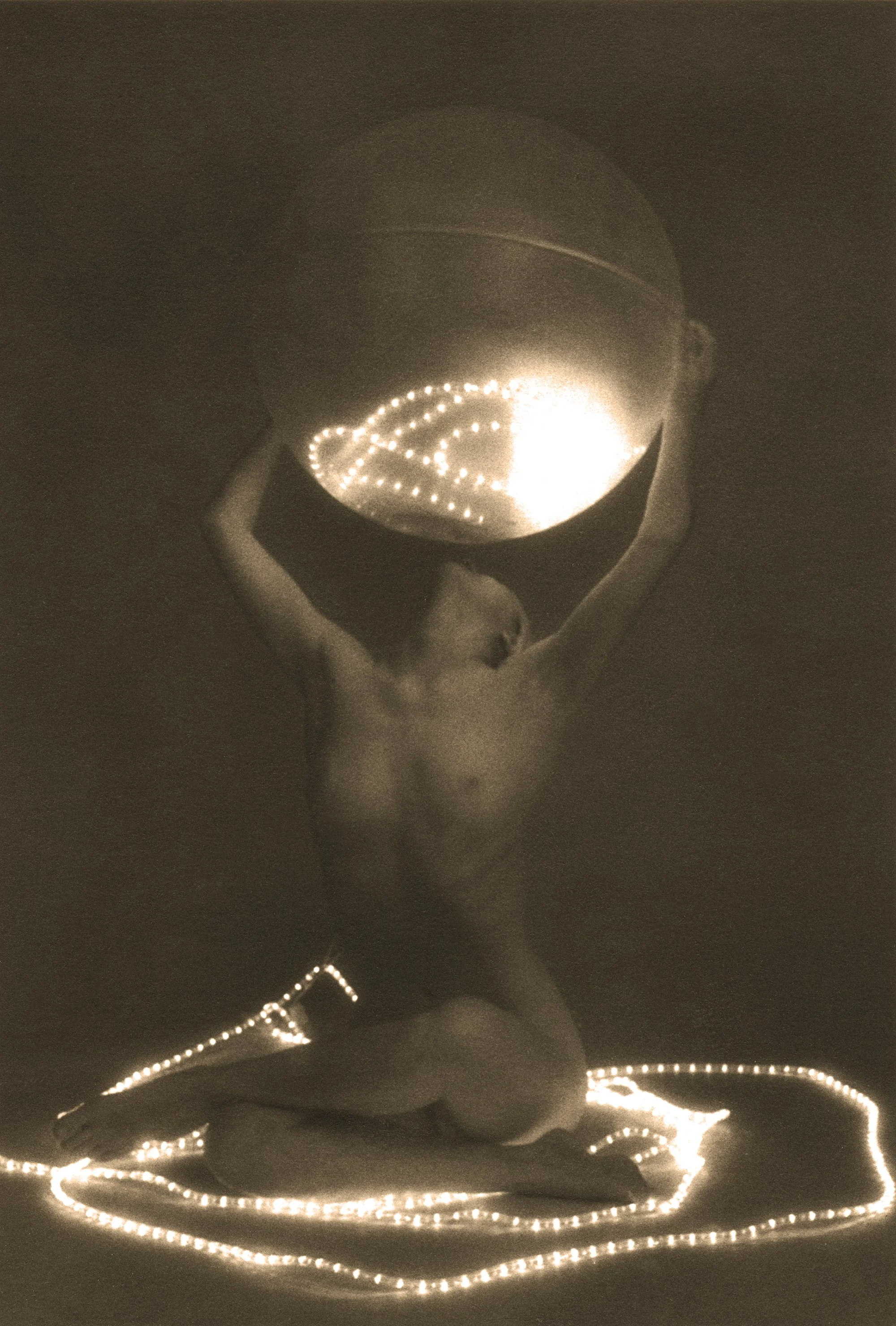 Fireball I, 2008, transparency gilded with 22K gold transferred from silver gelatin print, 14"h x 9"w and 21"h x 14"w