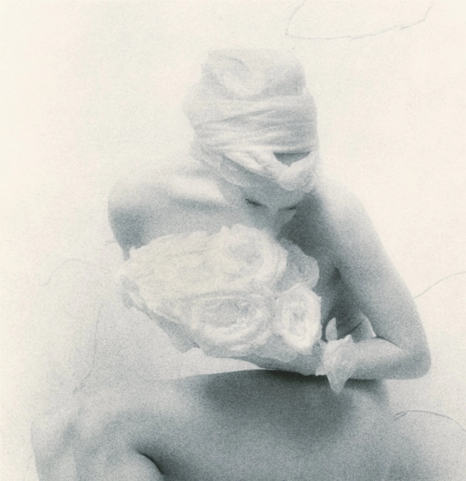 Woman with Roses, 1997, gold-toned silver gelatin print, w:8’’ h:10’’