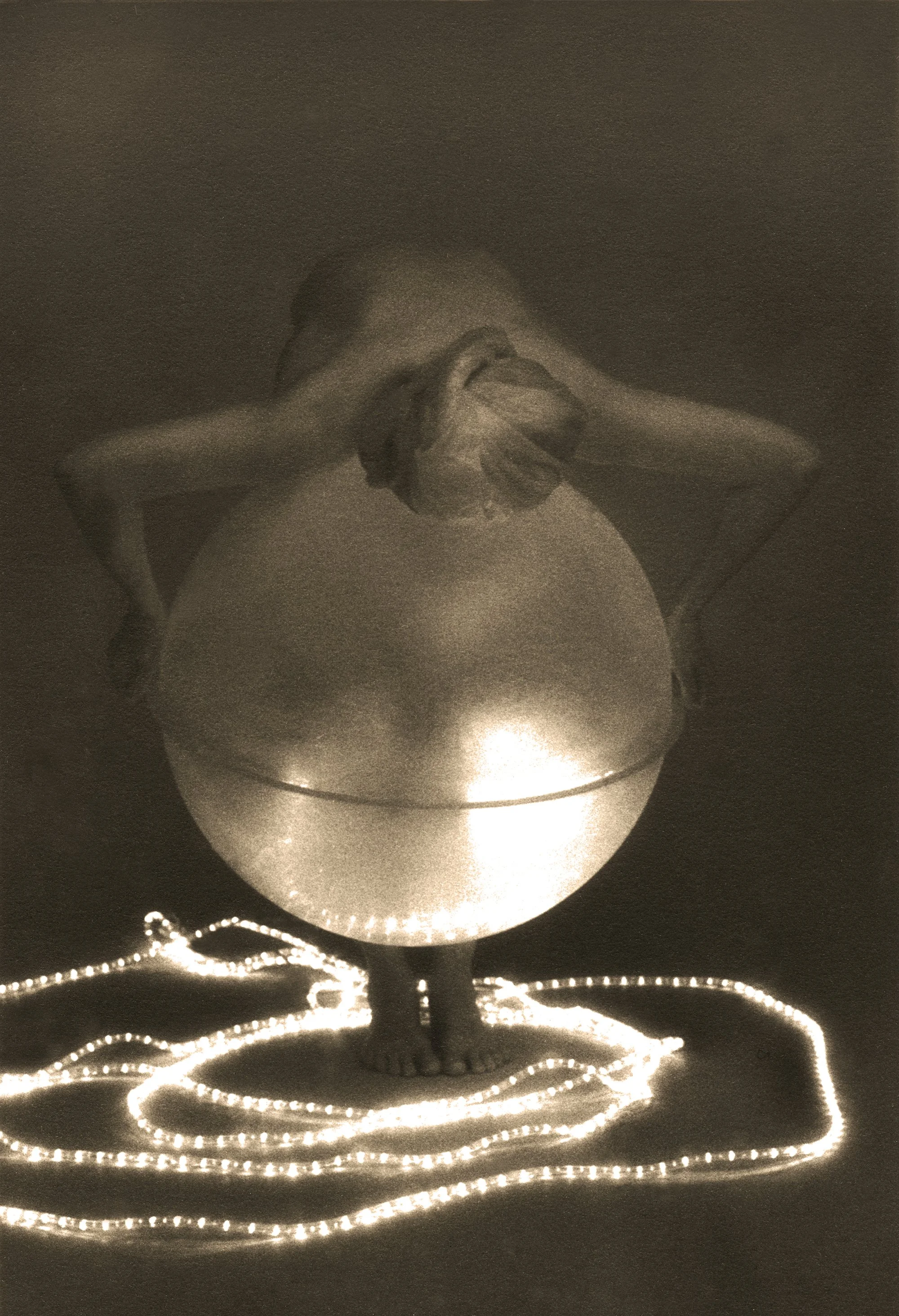 Fireball III, 2008, transparency gilded with 22K gold transferred from silver gelatin print, 21"h x 14"w