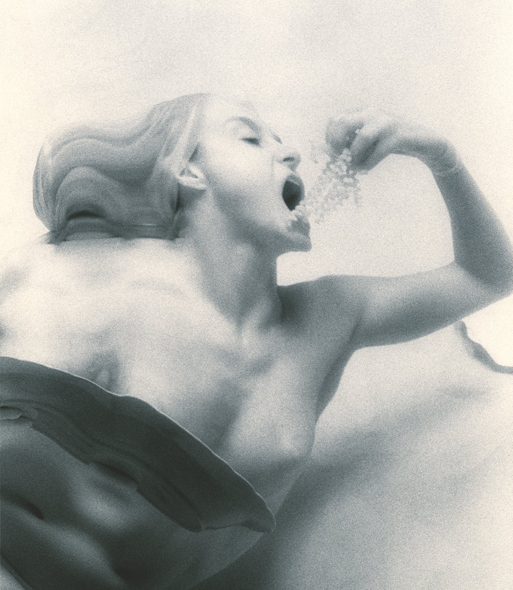 Spaghetti Eater, 1997, gold-toned silver gelatin print, w:8’’ h:10’’