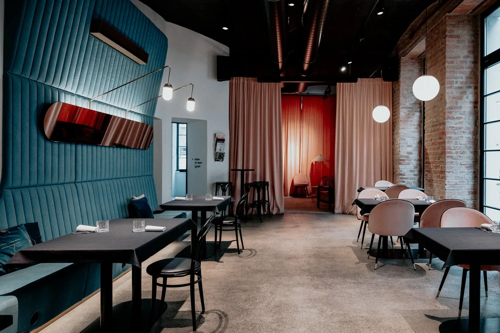 Restaurant interior with a warm red curtain