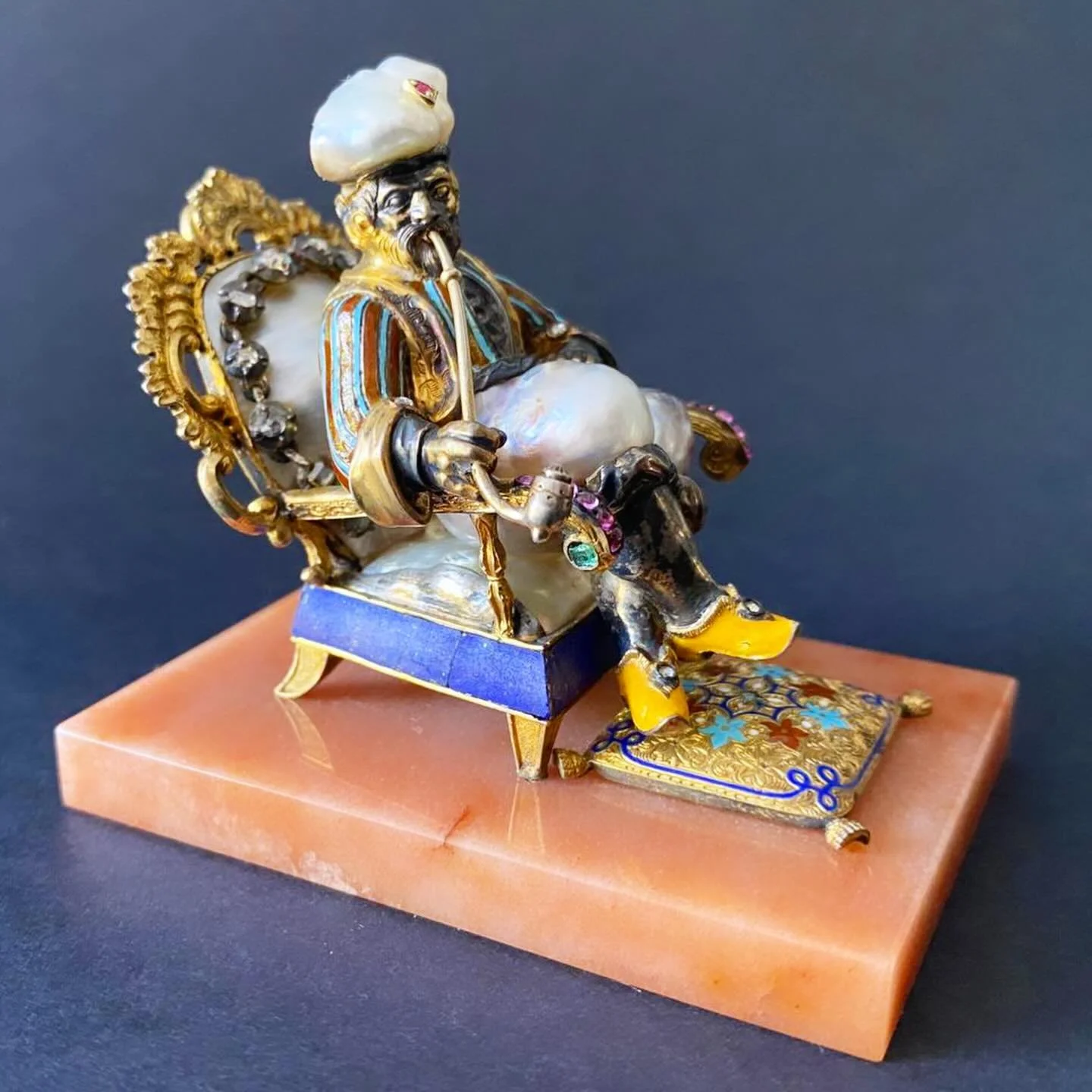 Rare and lovely 19th-century Orientalist pearl figure depicting a smoking nobleman (in the style of 17th-century pearl figures). 

The figure is made of silver, gilt silver, gold and enamel, crafted from various natural Baroque pearls that compose th