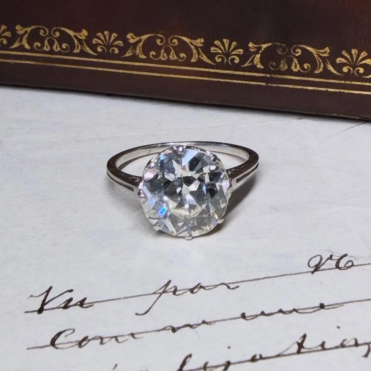 What better way to say "Yes 🕊️" than with a lovely antique ring from the early 20th century ? 

The charm of an old european cut diamond (+/- 3,50 ct) on a finely openwork mounting, leaves no room for competition 🏆

The ring has already f