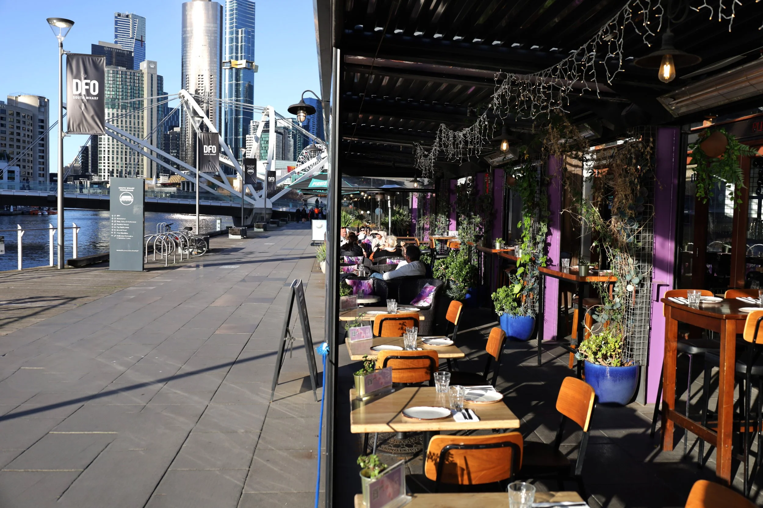 Outdoor dining by the Yarra River at Plus 5