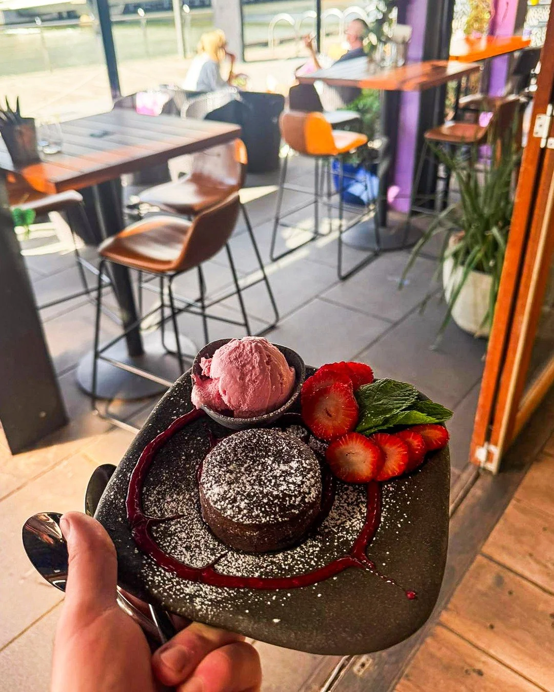 A sweet moment by the river 🍓

Dark chocolate fondant
with strawberry ice cream &amp; coulis
Warm, rich and hard to resist.