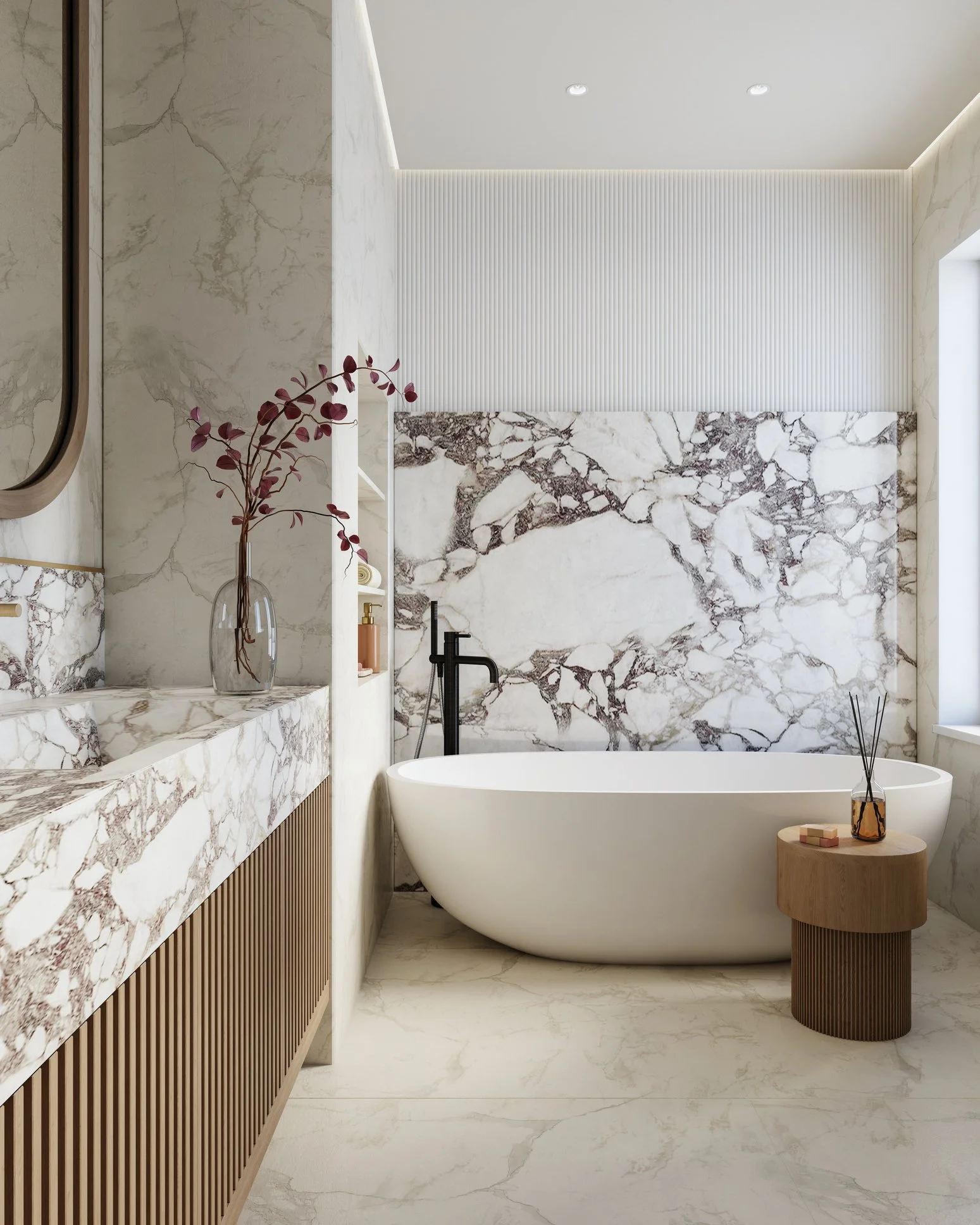 A modern bathroom with a freestanding bathtub, marble and wooden accents, and a decorative marble wall.