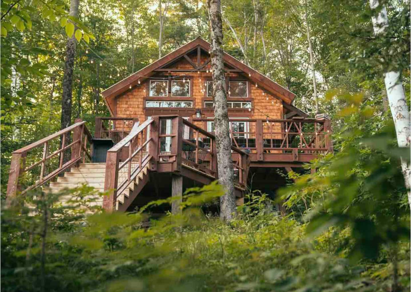  This upcycled,  one of a kind cottage  sits on the shore of Tully Pond with a breathtaking mountain view.    Typical starting price: $120    Location: Orange, Massachusetts     Sleeps: 6 guests    Rating: 4.96  