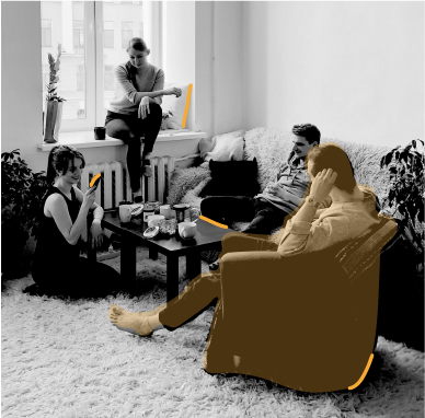Friends sitting around a loungeroom