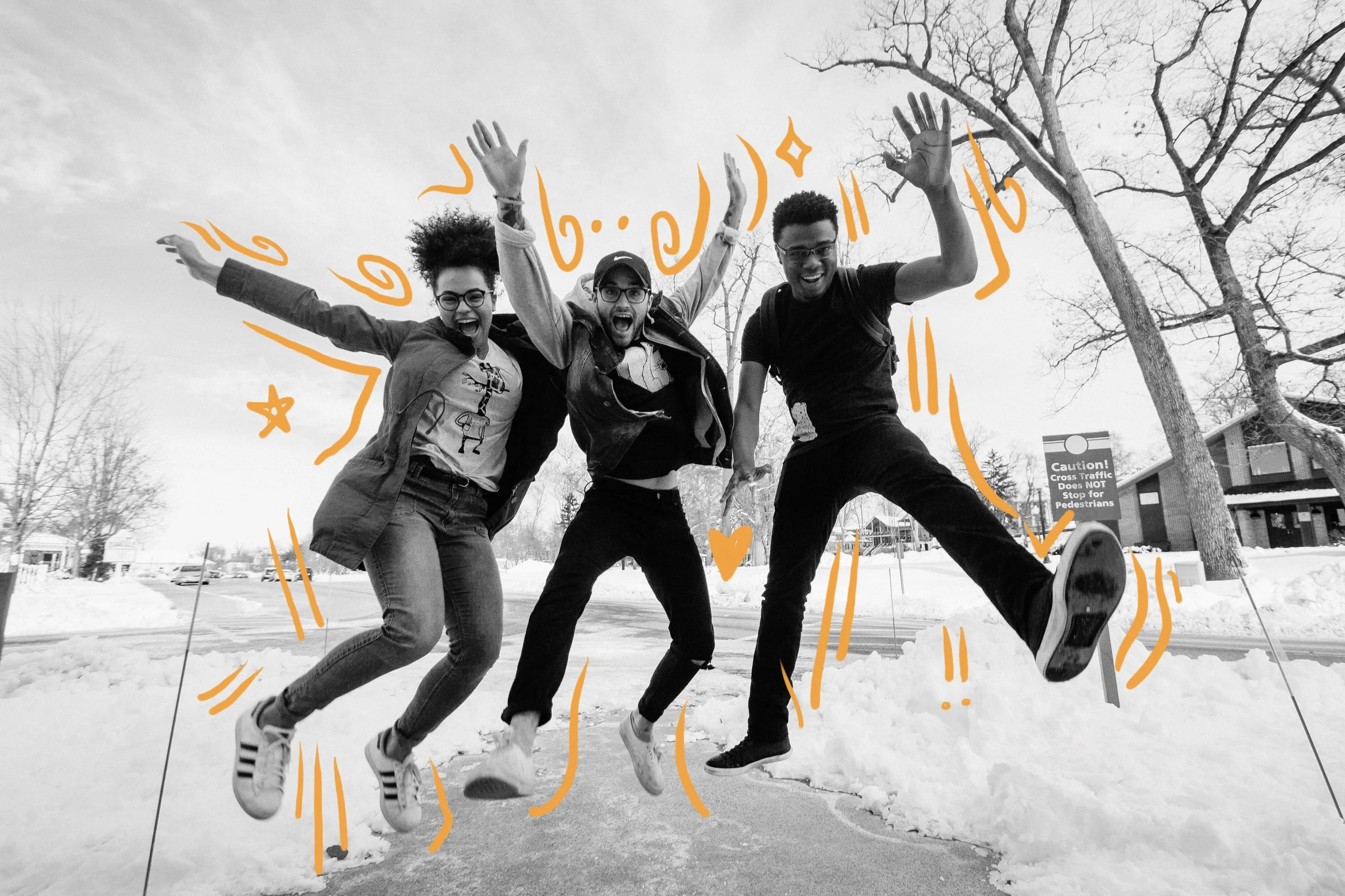 Friends jumping up in the air cheerfully