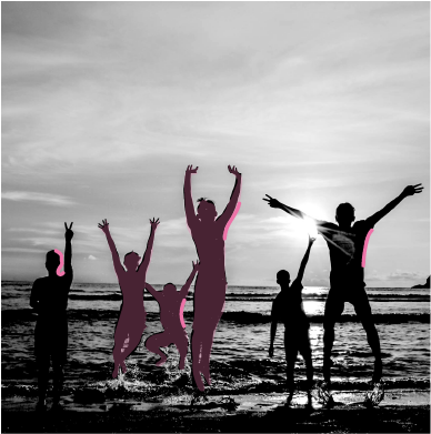 Friends jumping for joy on the beach