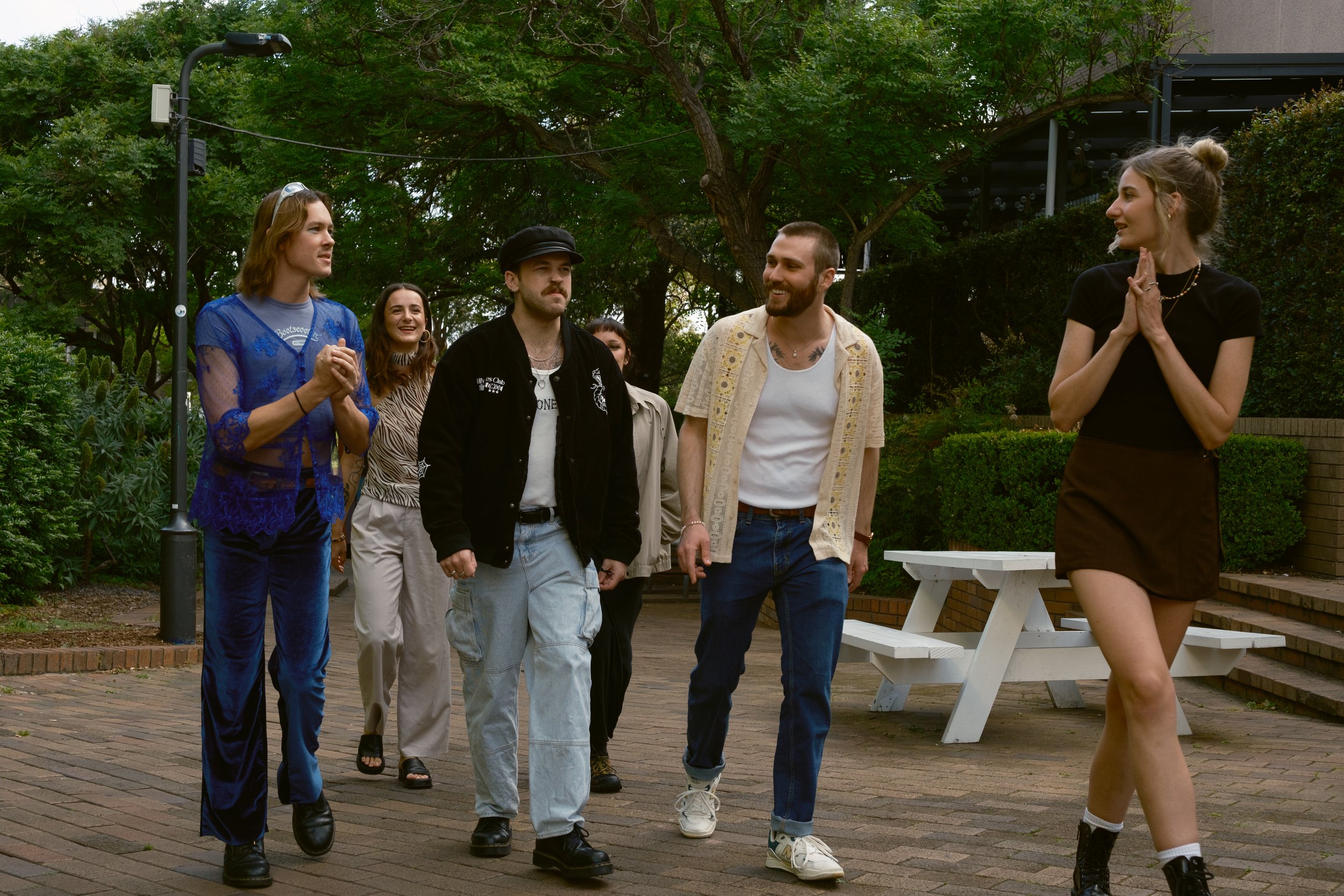 6 friends walking, talking, hand gestures.jpg