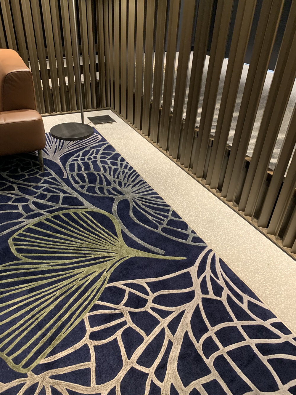 West Hotel Lift Foyer Carpet brass leather details.jpg