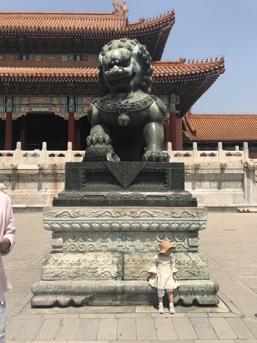 Forbidden City little girl with scary beast.jpg
