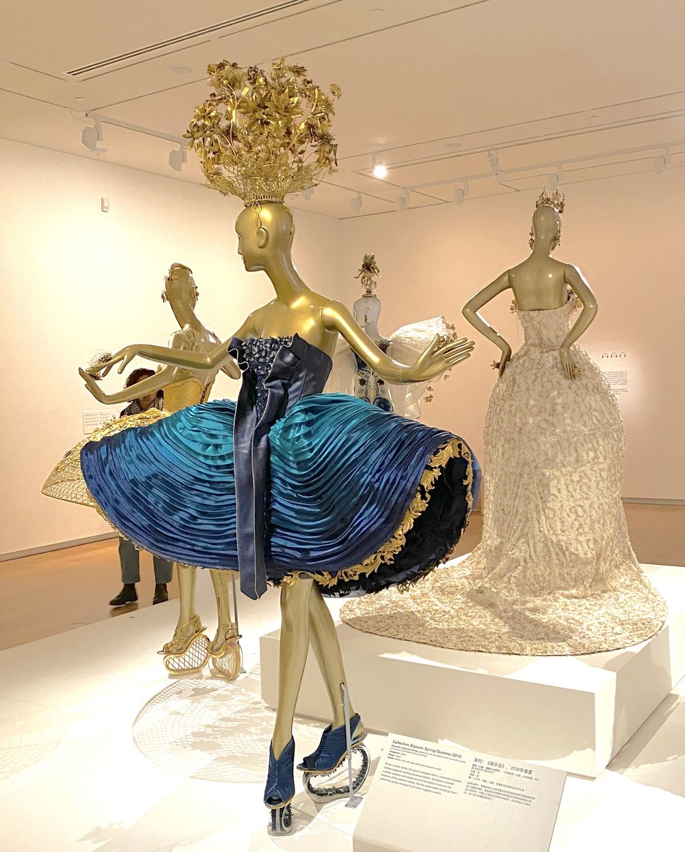 Guo Pei Blue and Gold dress with golden headress.jpg