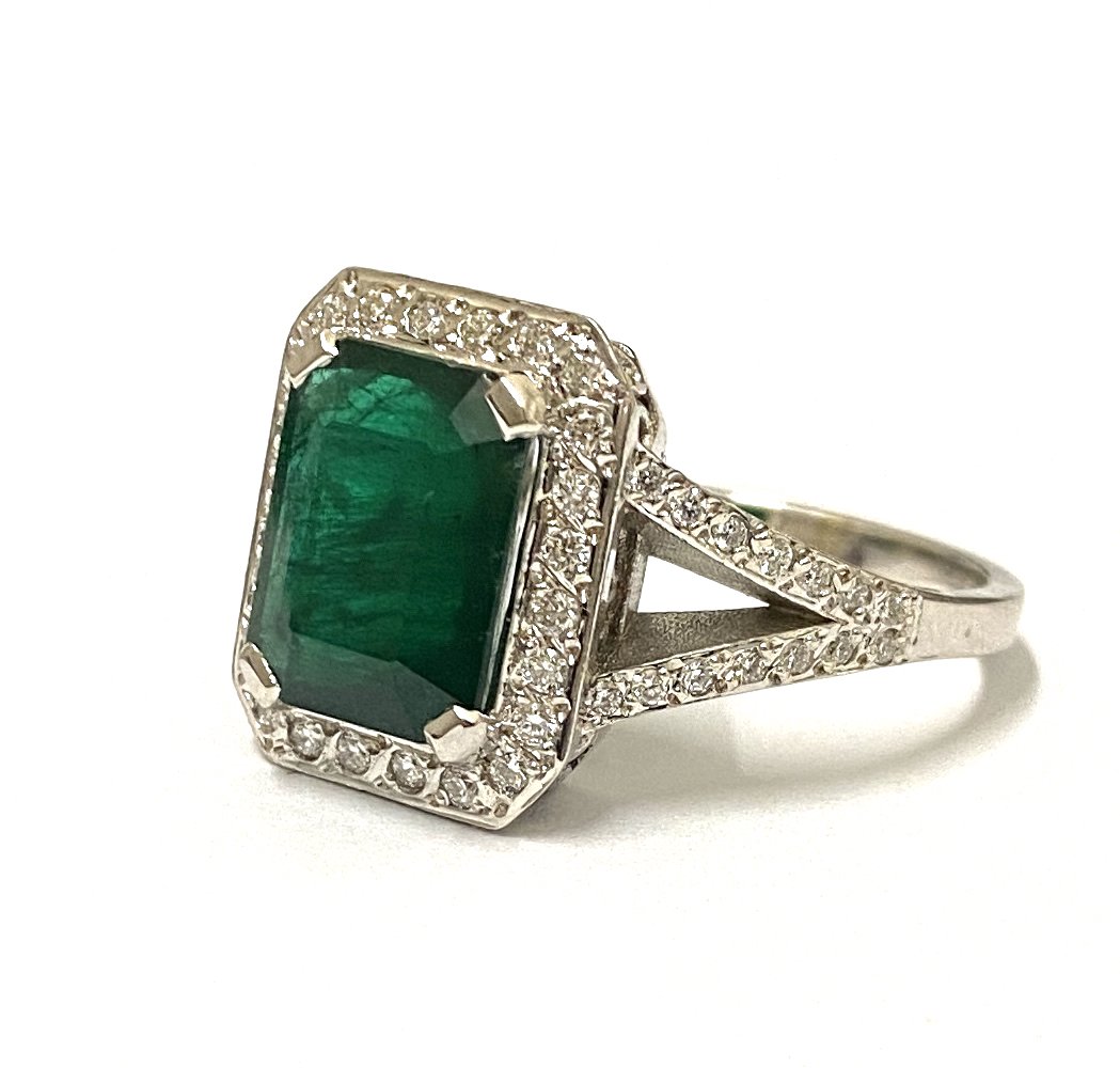 Emerald and Diamond Halo Ring.jpg