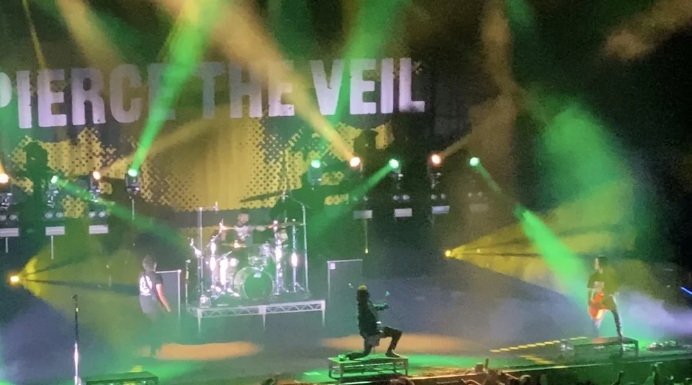 Pierce the Veil Vic Fuentes in full rock mode.jpeg