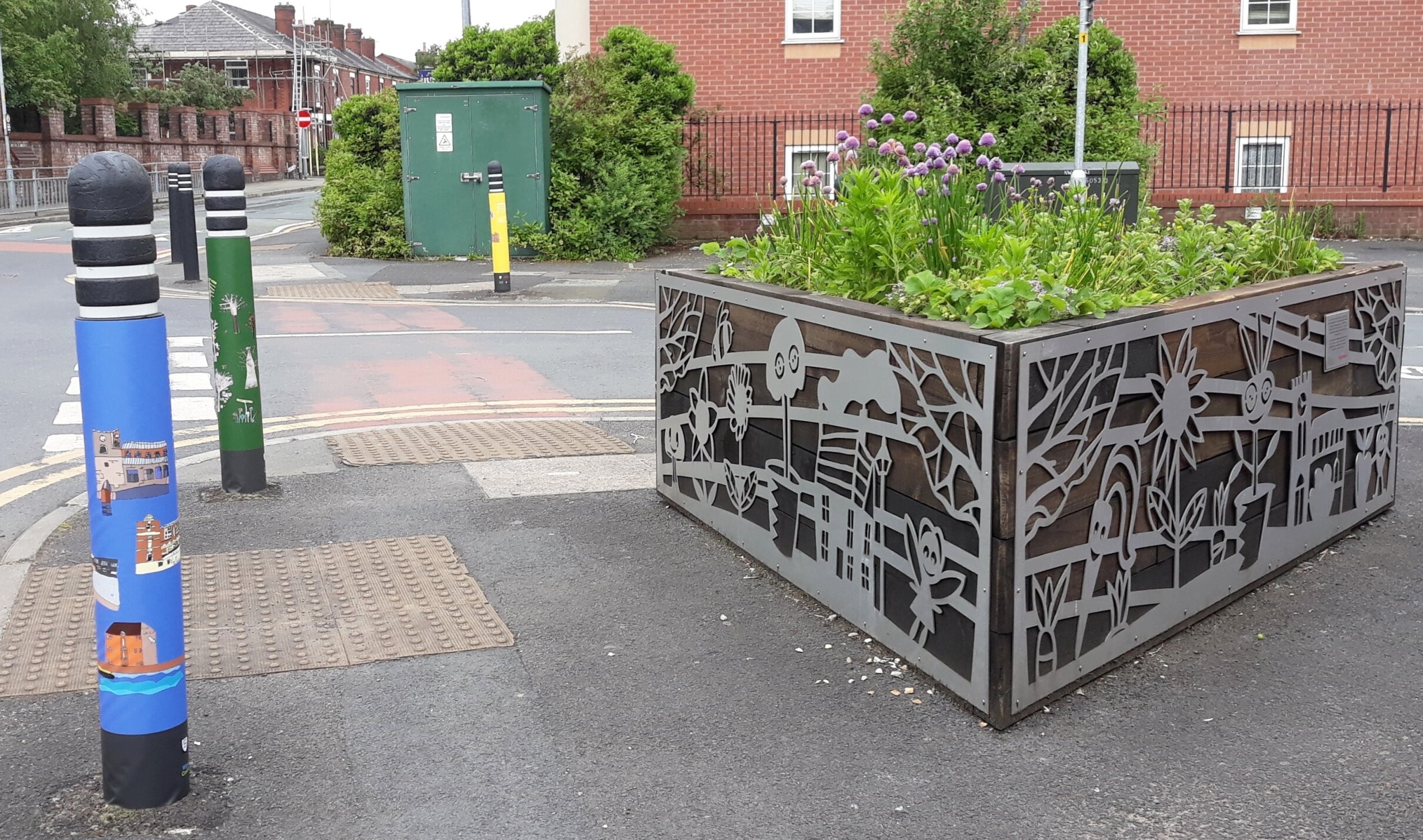 Bollard art and planter (2018-19). 