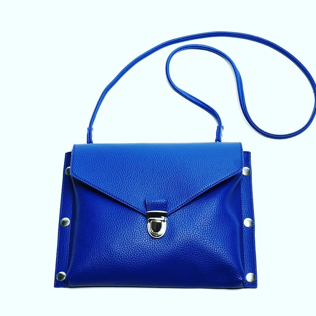 Our clutches save you time switching between your day and evening bag, and you won't forget your wallet! Just detach and go.

This blue goes with everything!

Photo features the 'Xanthe'.