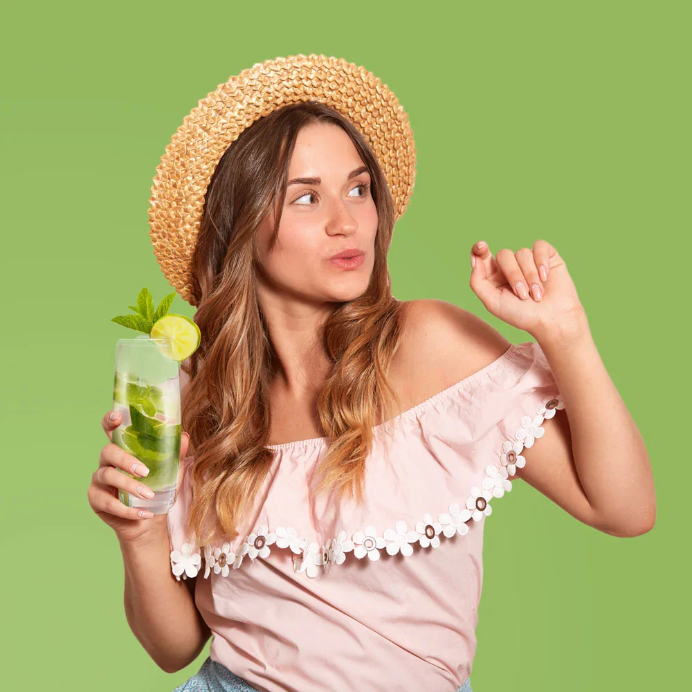 girl_holding_mojiti_glass_69bc827d-b8b8-4610-9ace-beb228c67680.jpg.webp