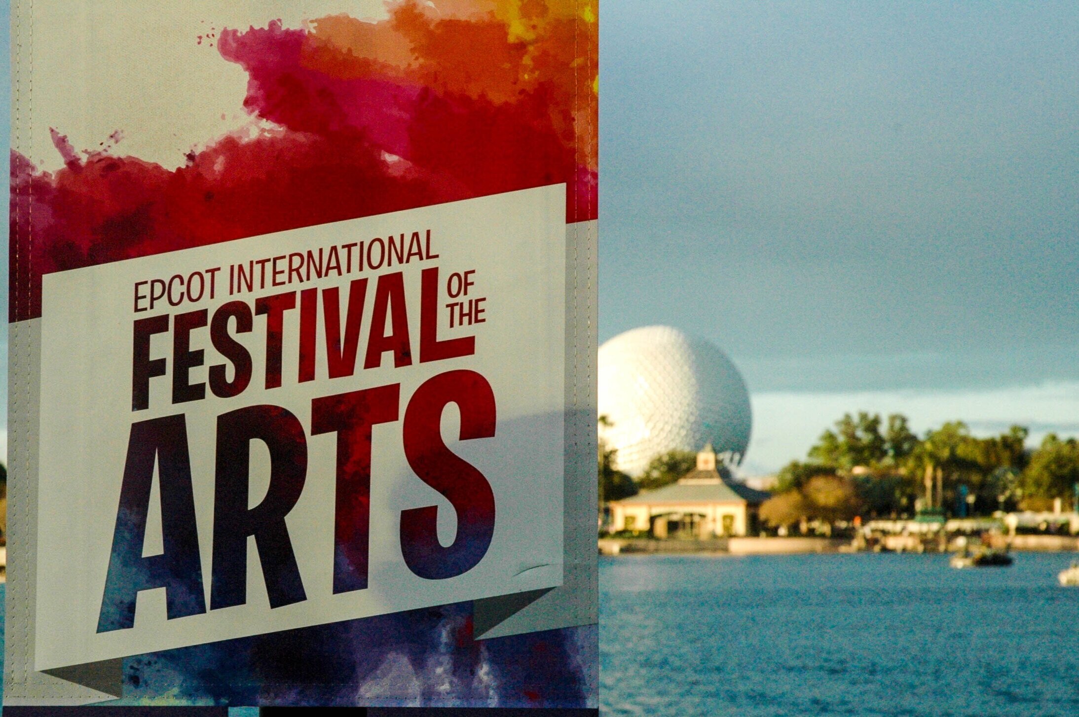 EPCOT Festival of the Arts sign in front of Spaceship Earth