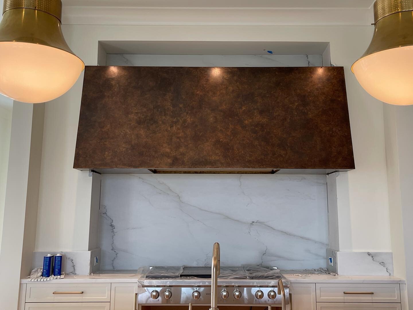 We installed this beautiful bronze range hood today. Proud to have such a great team in the shop that can turn our projects like this  #rangehood #customrangehood #bronzesculpture #bronzerangehood #metalwork #design #kitchendesign #interior design #d