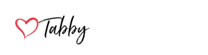 The image features a red heart outline next to the black cursive text 'Tabby'.