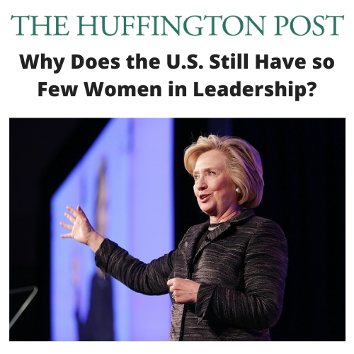 Hillary Clinton speaking at an event with a banner referencing The Huffington Post, discussing women's leadership in the U.S.