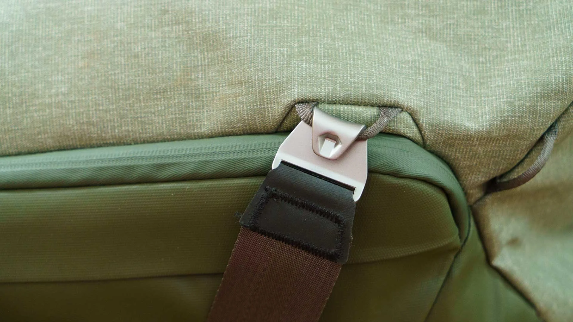  The straps on the Peak Design Travel Duffels can be removed quickly and reattached as needed. 