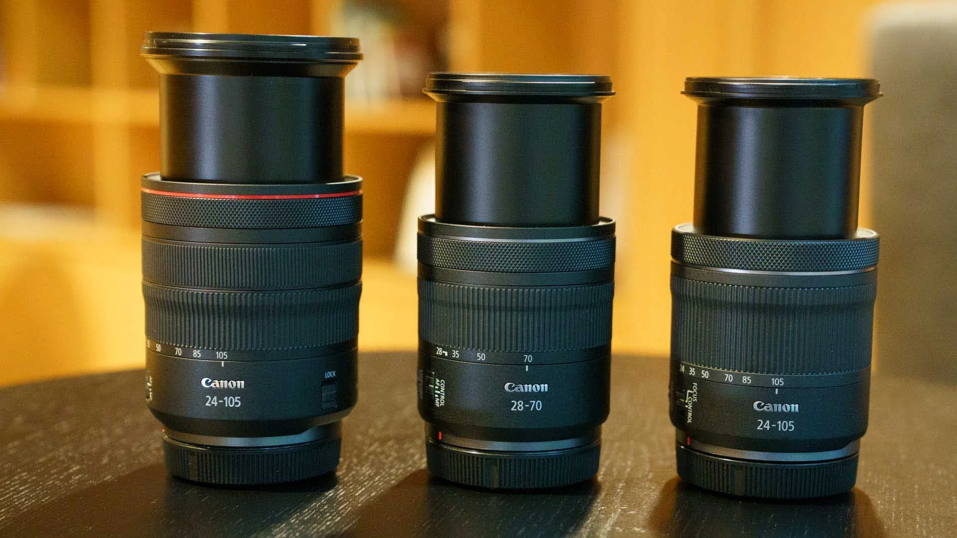 From left to right, the Canon RF 24-105mm F4 L IS USM, RF 28-70mm F2.8 IS STM and the RF 24-105mm F4-7.1 IS STM, all at their longest extension.