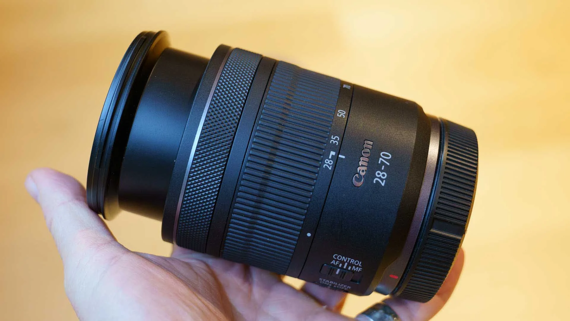 If the Canon RF 28-70mm F2.8 IS STM is collapsed for transportation, the zoom ring must be turned to the 28mm point to extended it ready for use.