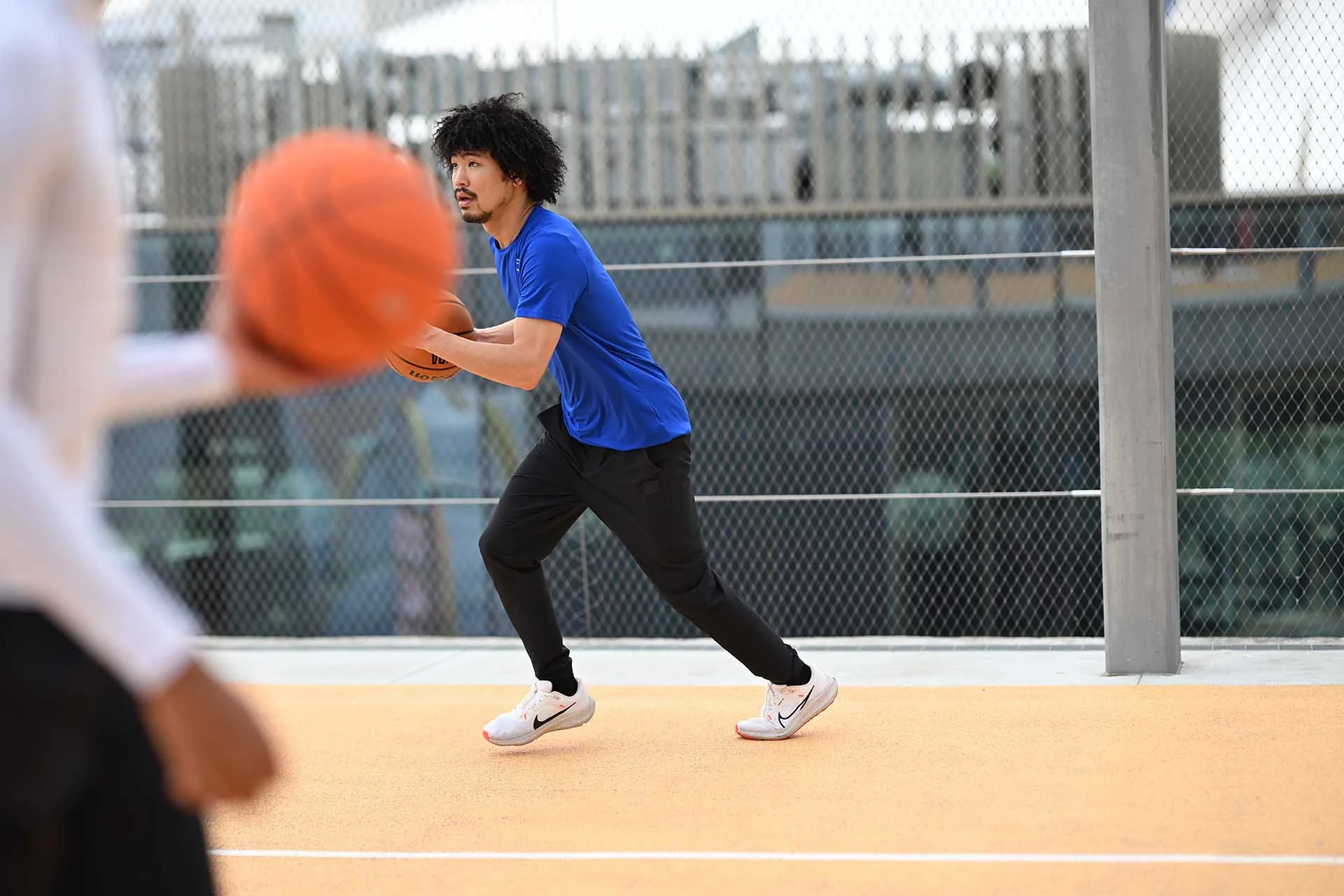  Image credit: Angela Nicholson. The Nikon Z6 III stayed with the intended subject despite the proximity of the basketball in the foreground. This image was shot at f/1.6 and 1/1250sec ISO 100 using the Nikon Nikkor Z 85mm f/1.2 S lens. 