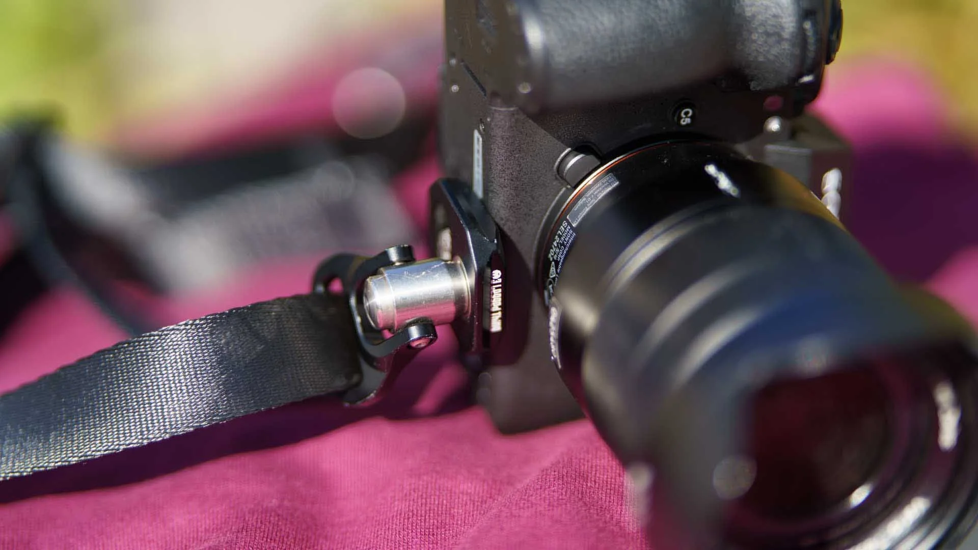 A QD Plate on a camera with the QD Swivel connector attached