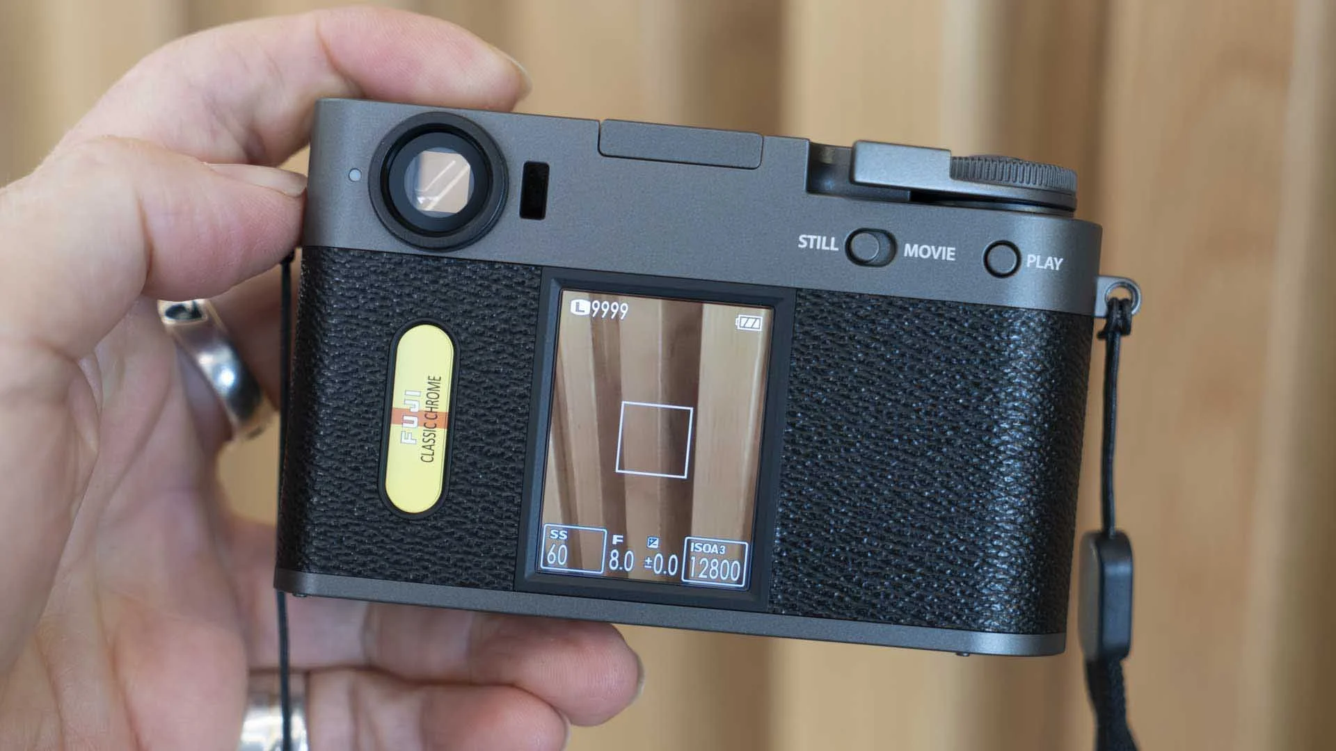  The small sub screen on the left of the back of the X half shows the selected Film Simulation Mode. Swiping up or down on that screen moves through the 13 options. 