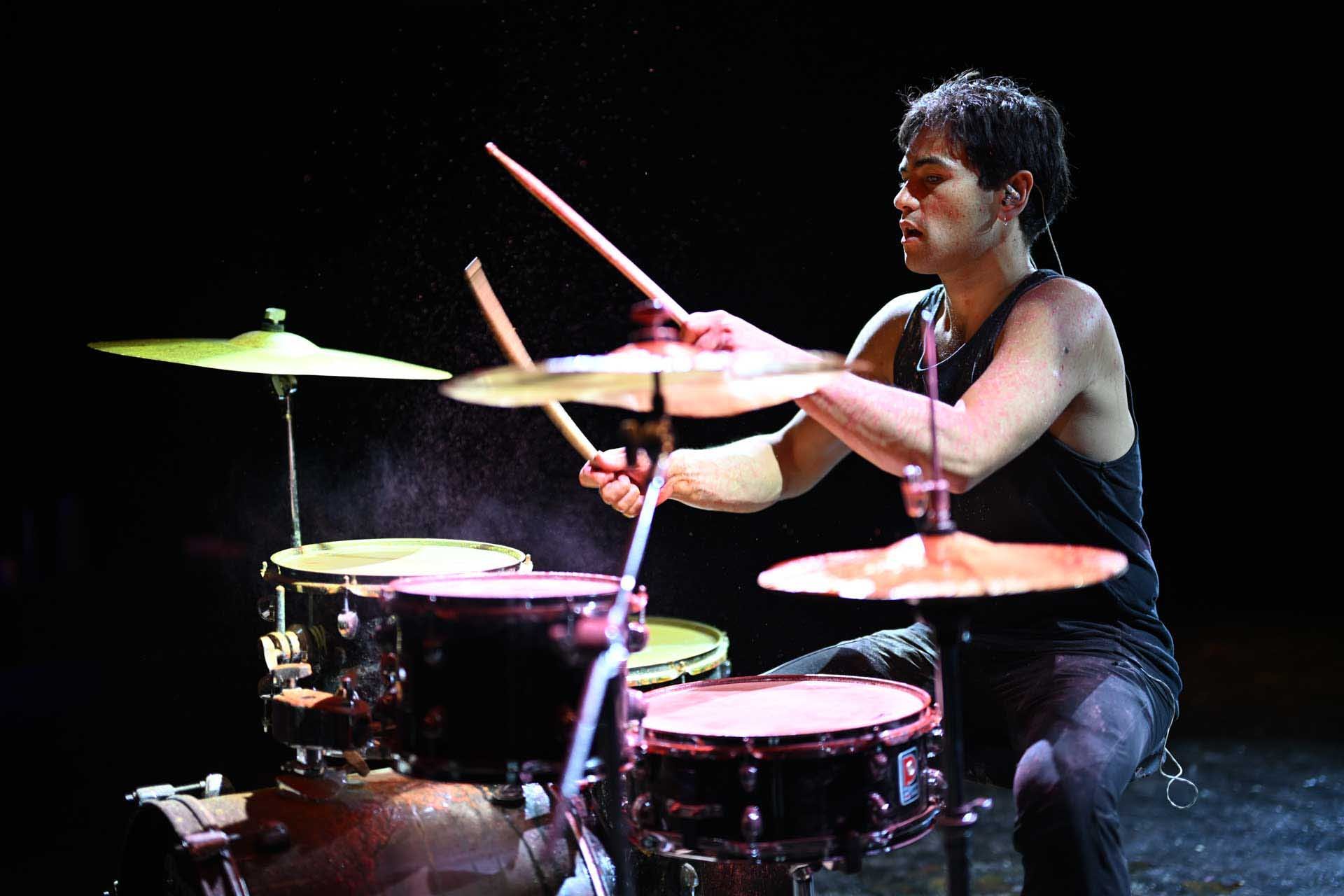 Rolling shutter effect has caused a slight bend to one of the drumsticks here. It’s only visible in two or three images out of over 300. Image credit: Angela Nicholson. Camera: Nikon ZR, Lens: Nikon Nikkor Z 50mm F1.2 S at f/1.2, 1/1000 sec and ISO 500.