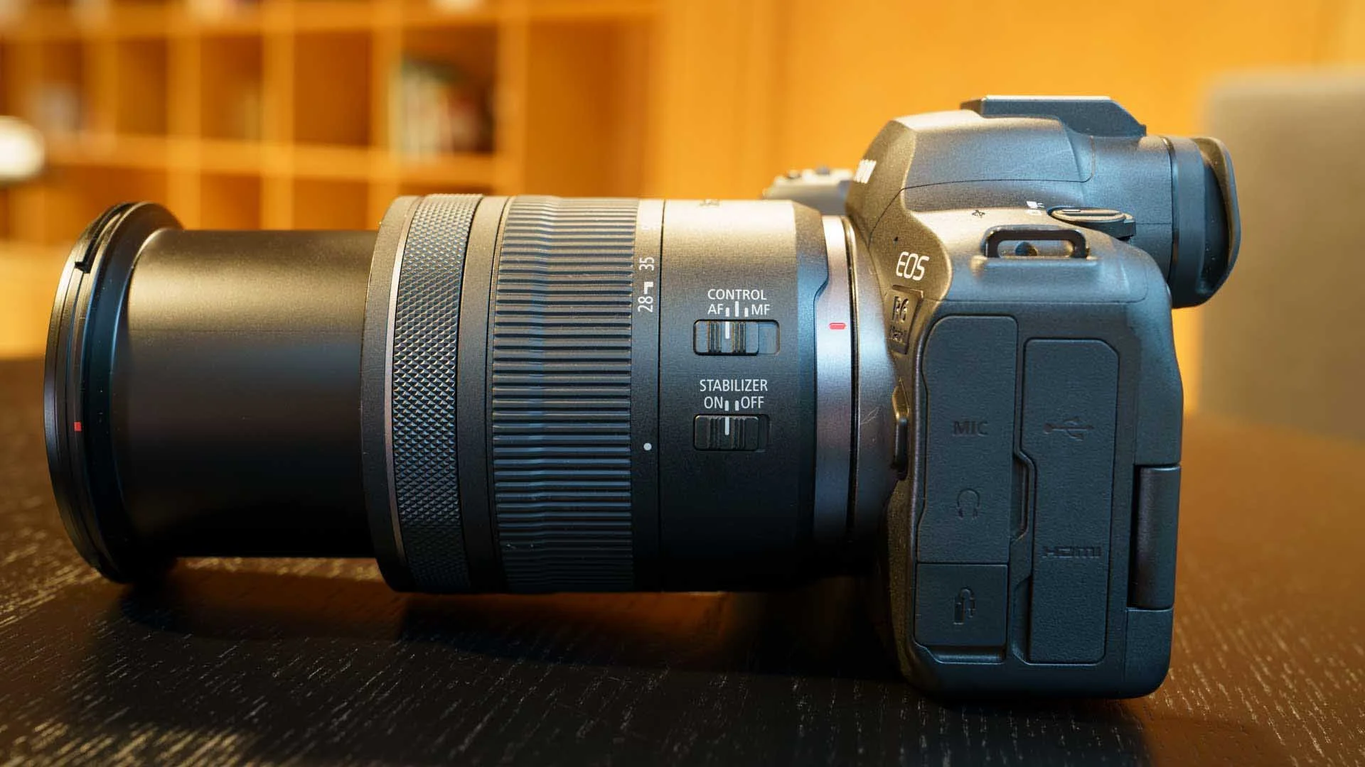 The two switches on the side of the Canon RF 28-70mm F2.8 IS STM are within easy reach of your left thumb when supporting the lens.