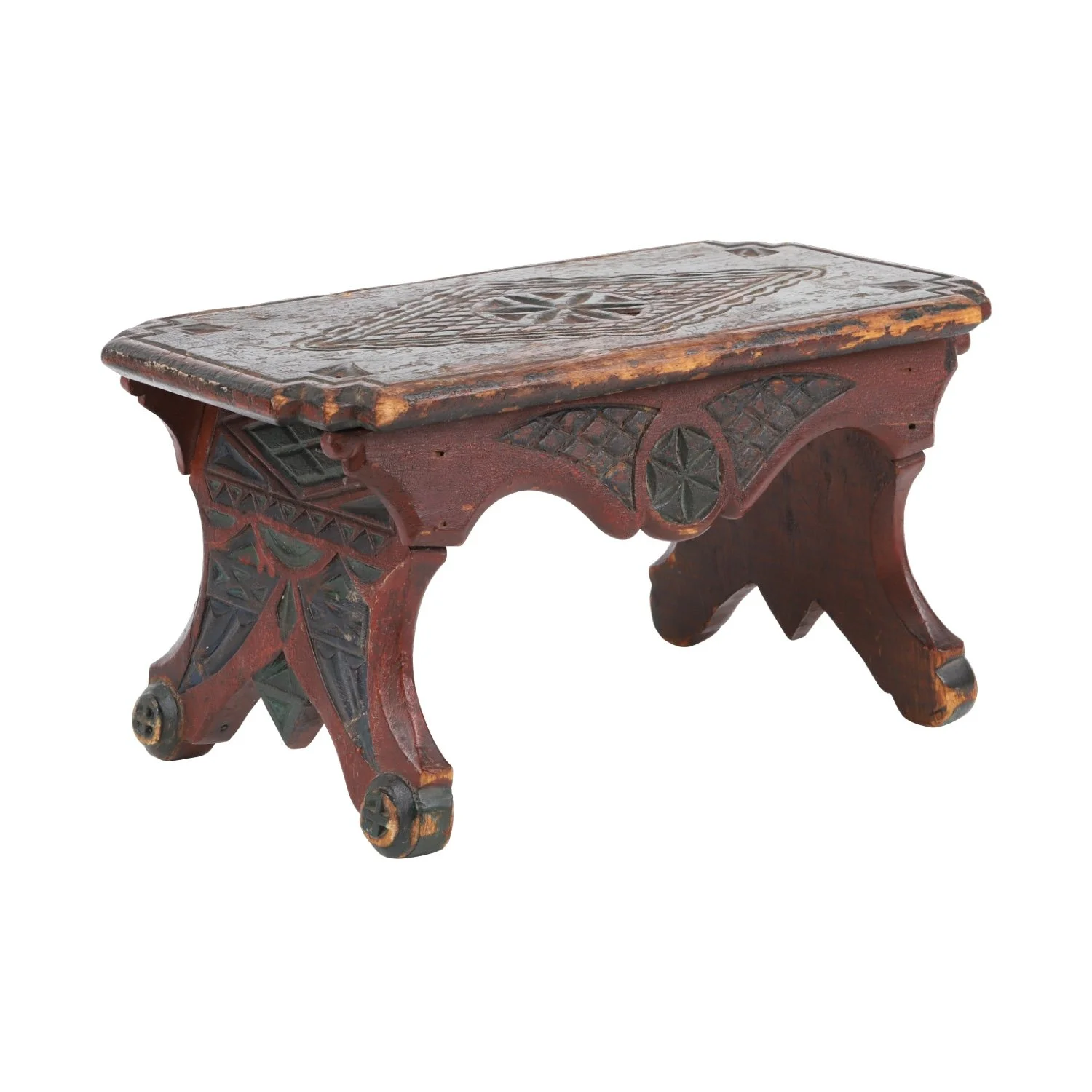 This masterful Nova Scotia foot stool in the Lunenburg Germanic tradition with original red/green paint and exuberant geometric carving blew past estimate to finish at CA$24,780.