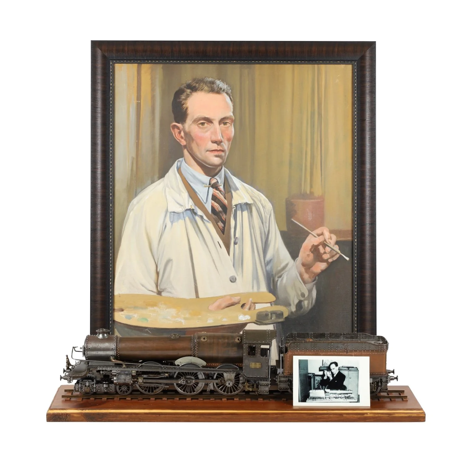 King George V working model steam locomotive made out of metal and wood, an impressive creation built in the 1920s by William Edward Burgess of England (est. CA$9,000-$12,000).