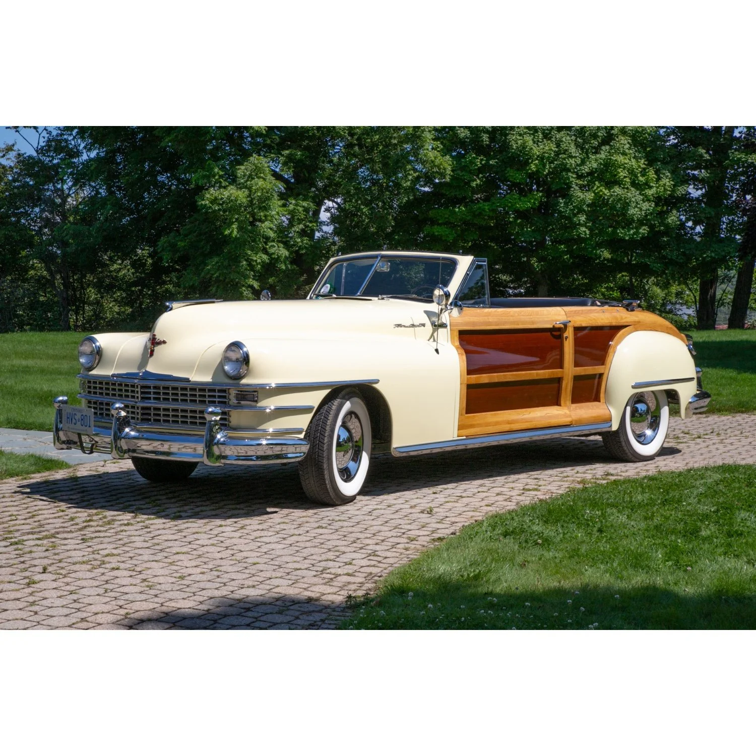 Lemon yellow 1948 Chrysler Town &amp; Country convertible car with stunning wood features, an American-made beauty and one of only 8,809 units produced (est. CA$85,000-$110,000).  