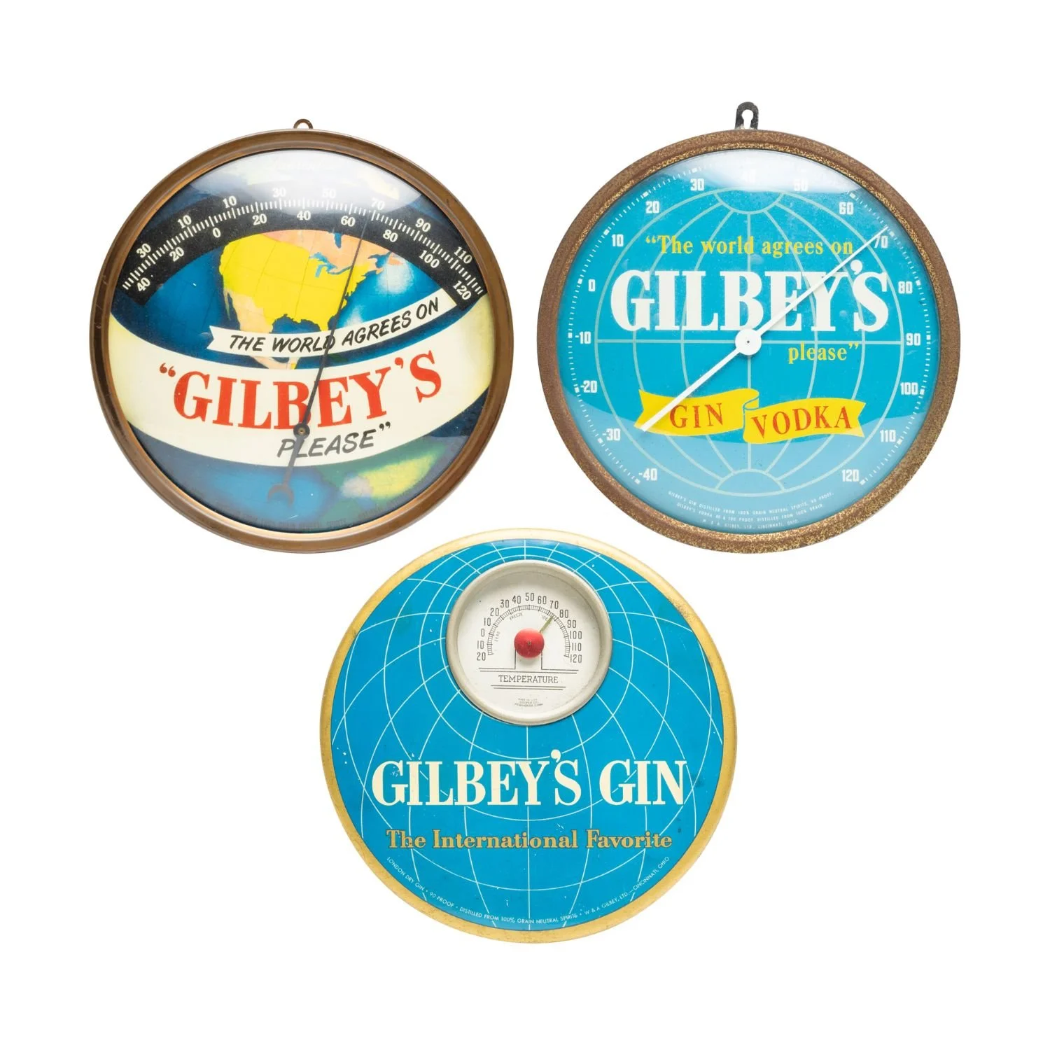 1970s Gilbey’s Gin and Vodka reverse-painted glass advertising thermometers. Estimate: CA$600–$900.