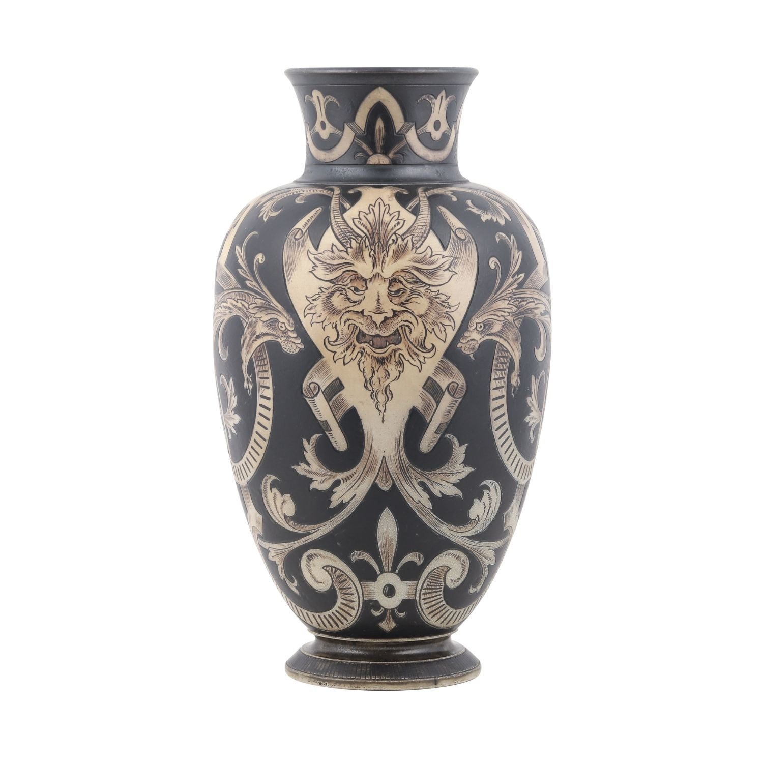 Martin Brothers Gothic Vase: British, 1896, decorated with dragons and green men in striking black-and-white patterning, realized CA$7,260.