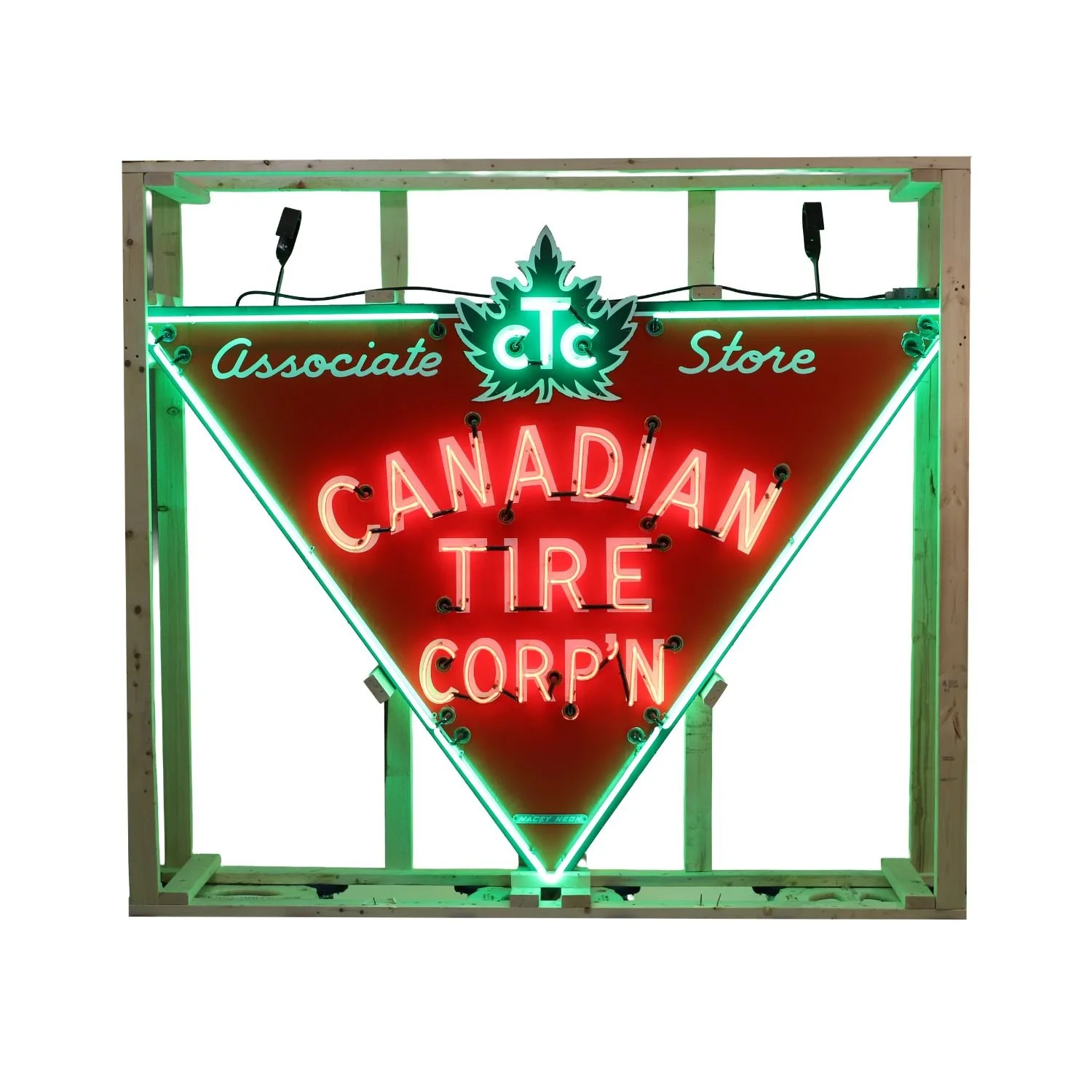 Canadian Tire Corporation Associate Store Neon Sign: Monumental 1940s double-sided porcelain neon celebrating the debut of Canadian Tire's famous inverted triangle logo (CA$72,600).
